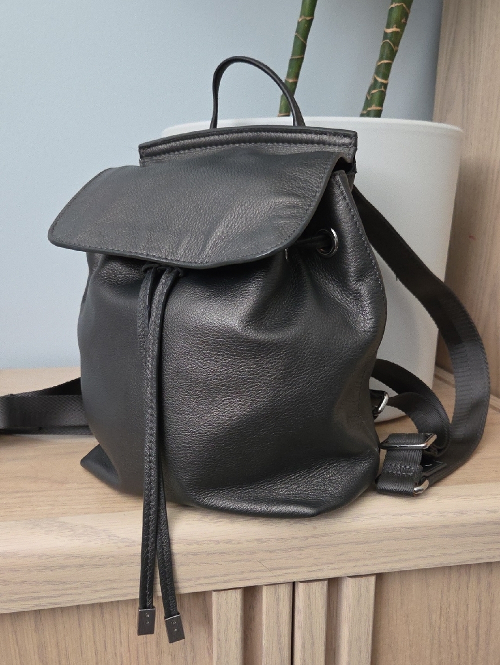 Danier Gunmetal Gray Leather Drawstring Bucket Backpack with Silver Hardware
